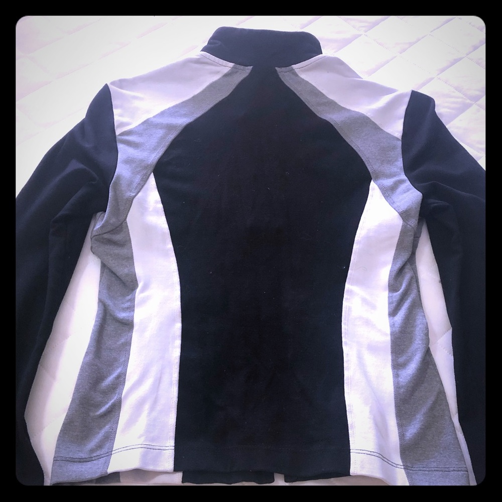 BEBE sport fitted zip up jacket.